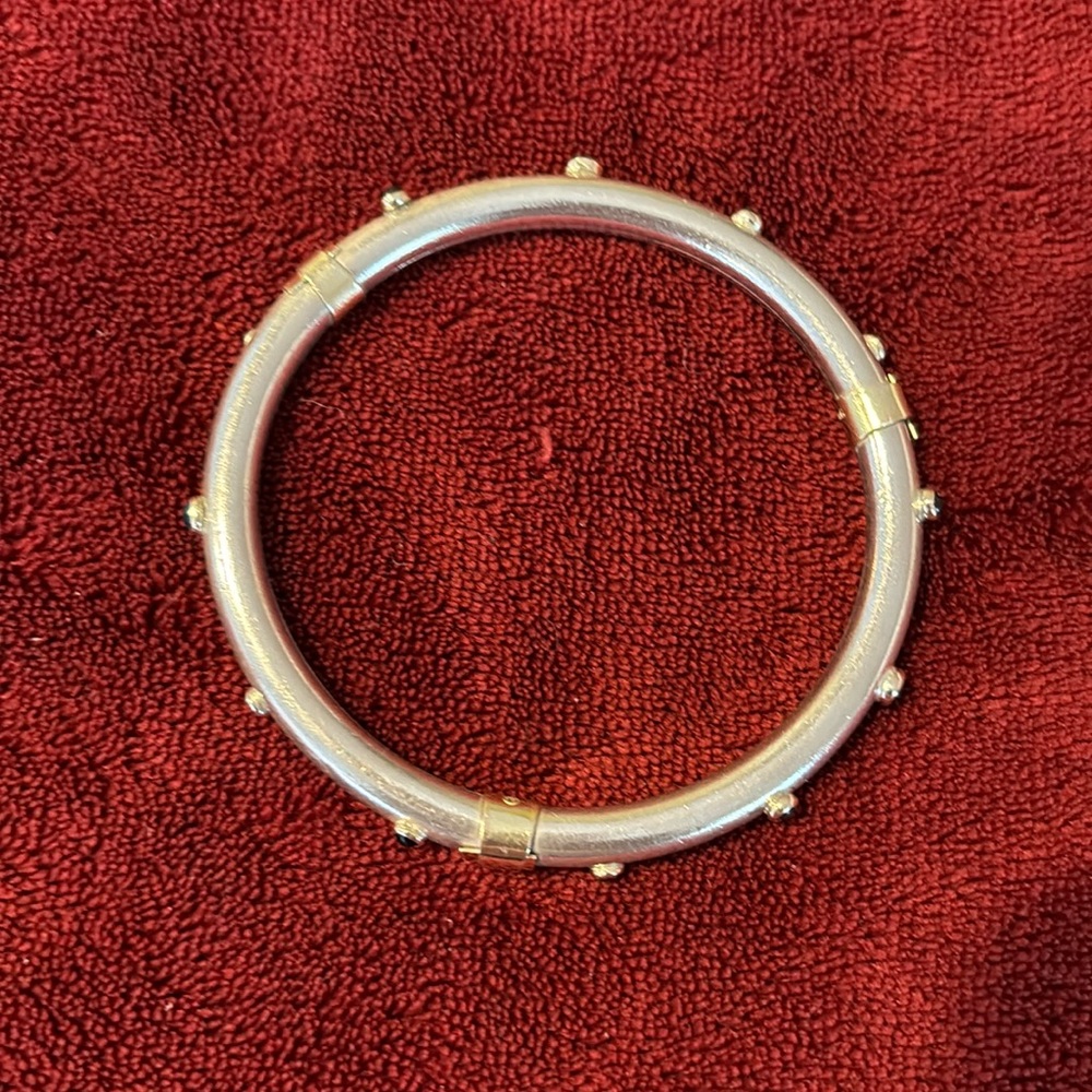 Beautiful silver bangle with stones.